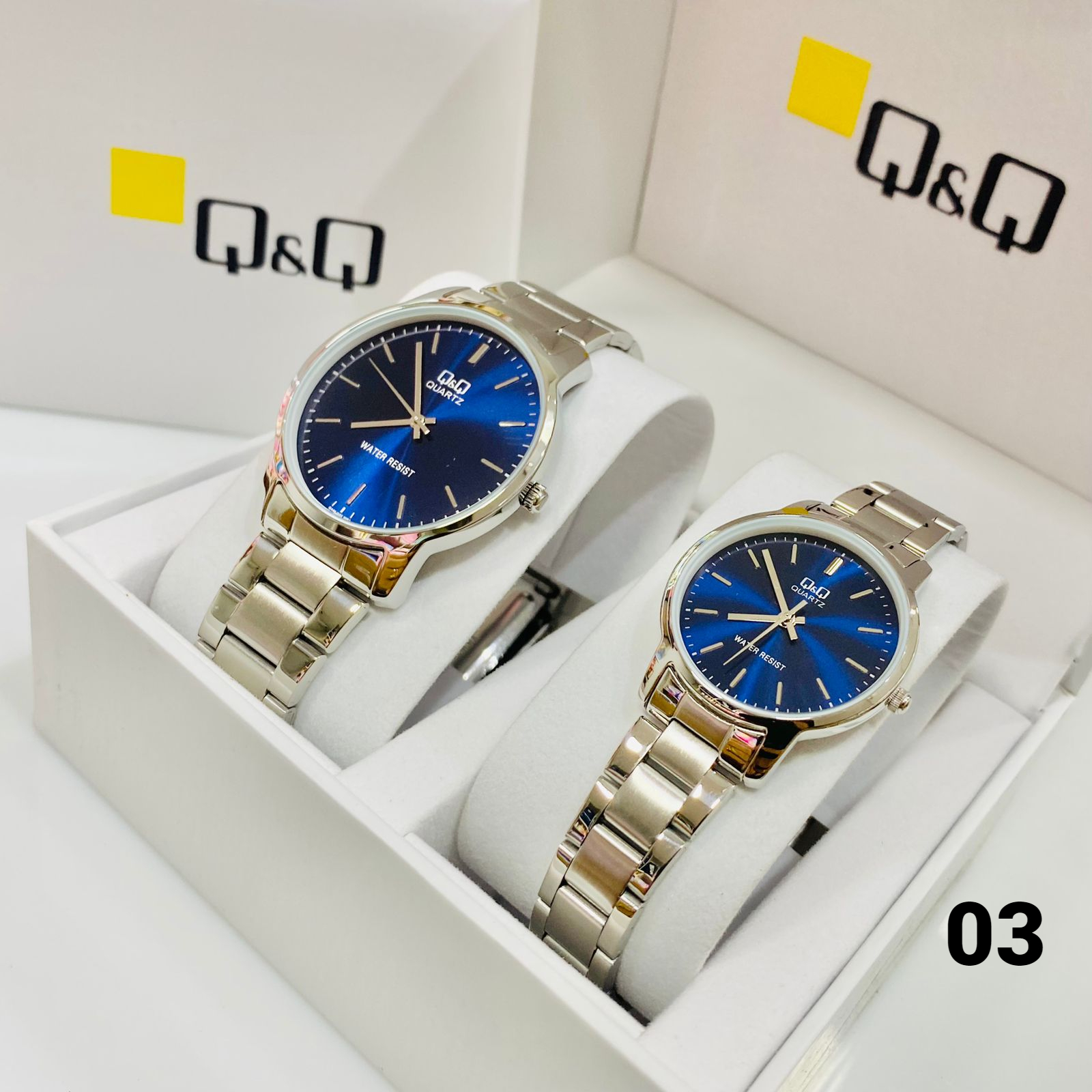 RELOJ QYQ PLATEADO FONDO AZUL DAMA